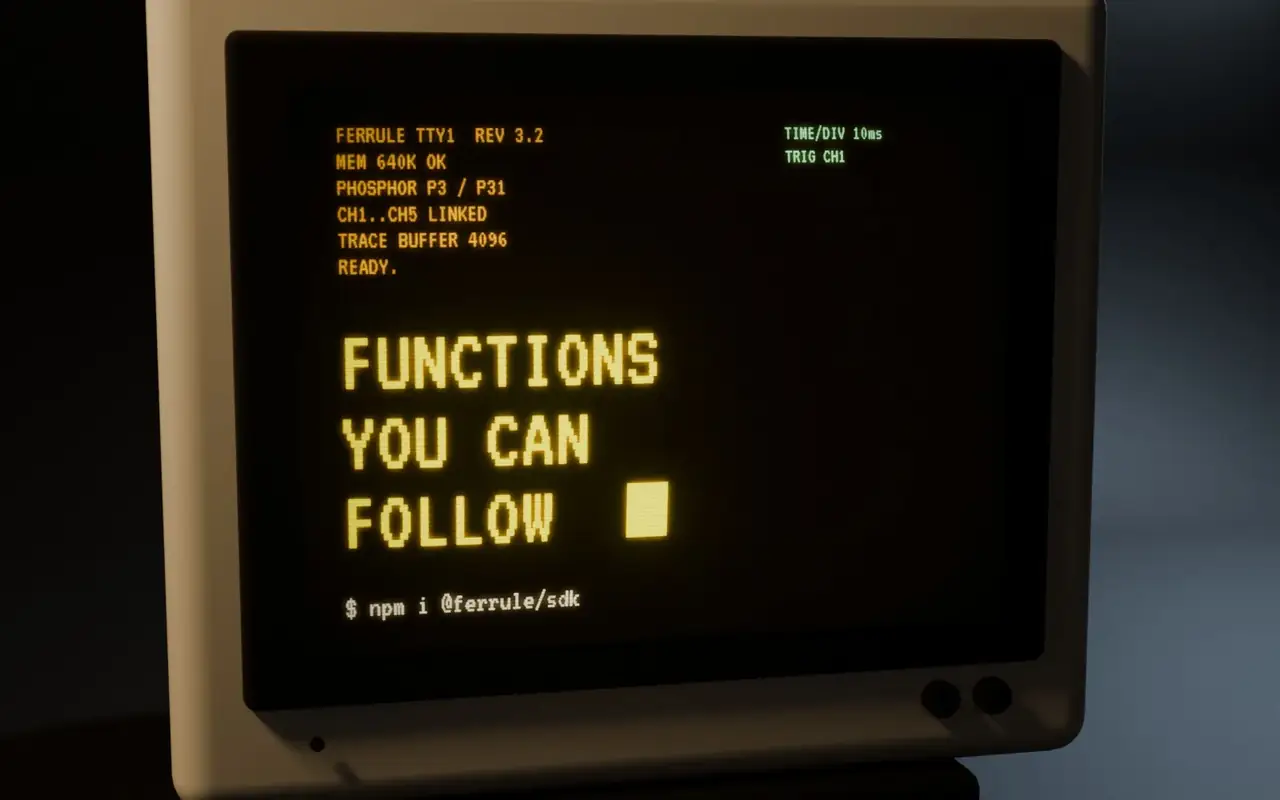 The amber terminal after power-on: the boot log reads READY, then FUNCTIONS YOU CAN FOLLOW and the install line npm i @ferrule/sdk.